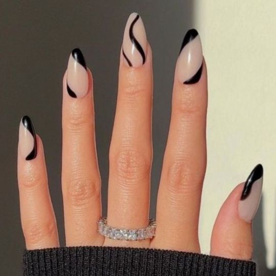 abstract black and nude almond nails